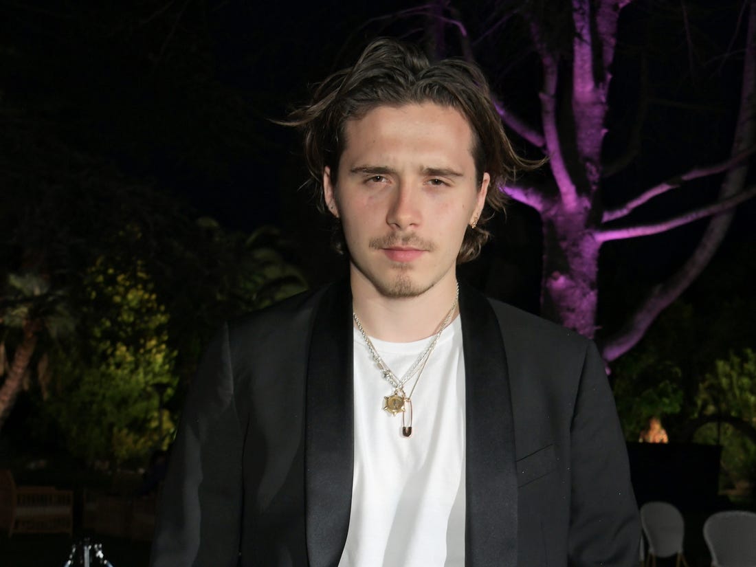 How tall is Brooklyn Beckham?